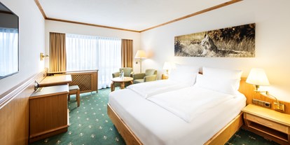 Luxusurlaub - Bayern - Komfort-Zimmer zur Südseite mit einem Balkon oder Terrasse - Hotel Sonnenhof Lam im Bayerischen Wald