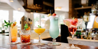 Luxusurlaub - Salzburg - Genießen Sie unsere Cocktailvariationen an unserer Hotelbar - CESTA GRAND  Aktivhotel & Spa