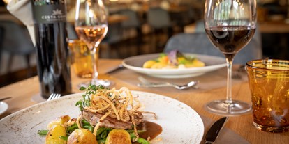 Luxusurlaub - Salzburg - Genießen Sie unsere leckeren Speisen in unserem Restaurant "Herd & Seele" - CESTA GRAND  Aktivhotel & Spa