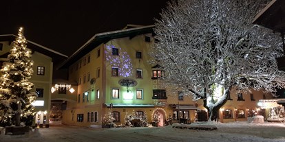 Luxusurlaub - Tiroler Unterland - Außenansicht Winter
Eingang Restaurant - Hotel „Der Kirchenwirt****s"